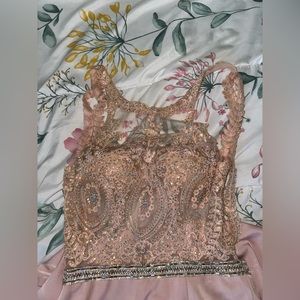 Pink prom dress with lace and backless straps that connect into leaves size